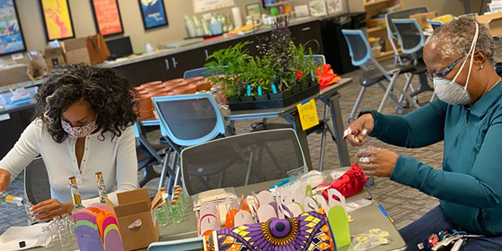 The CompassPoint team putting together care bags for participants of our Self-Care for Black Women in Leadership Program.